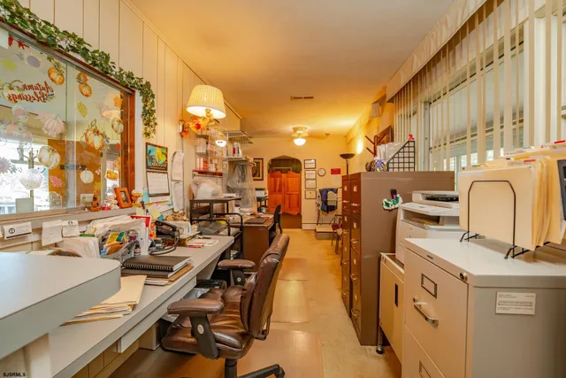 a view of a kitchen with a large window
