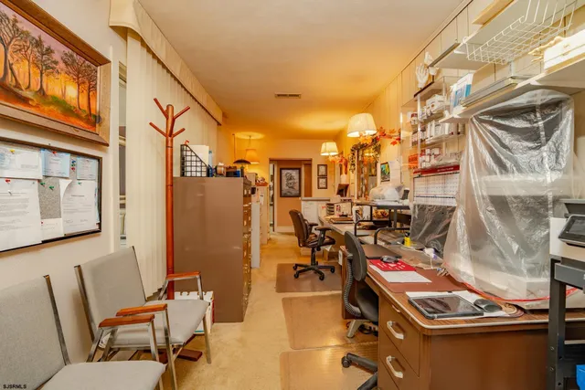 a view of a chairs and table in a patio