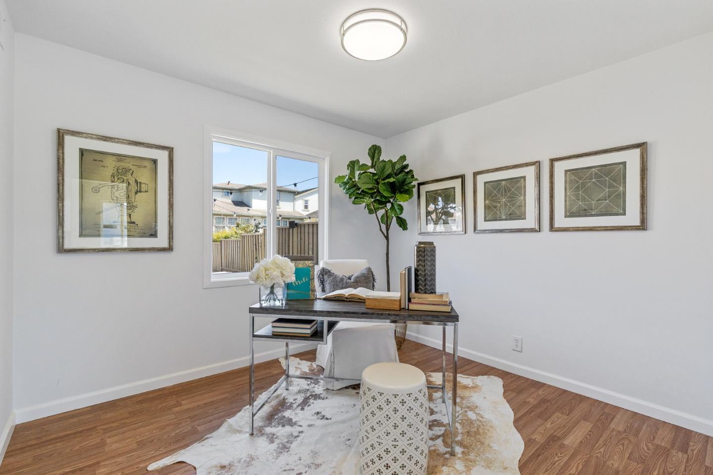 551 Inverness Drive Pacifica, CA 94044 - Photo 17 of 37 a workspace with furniture and window