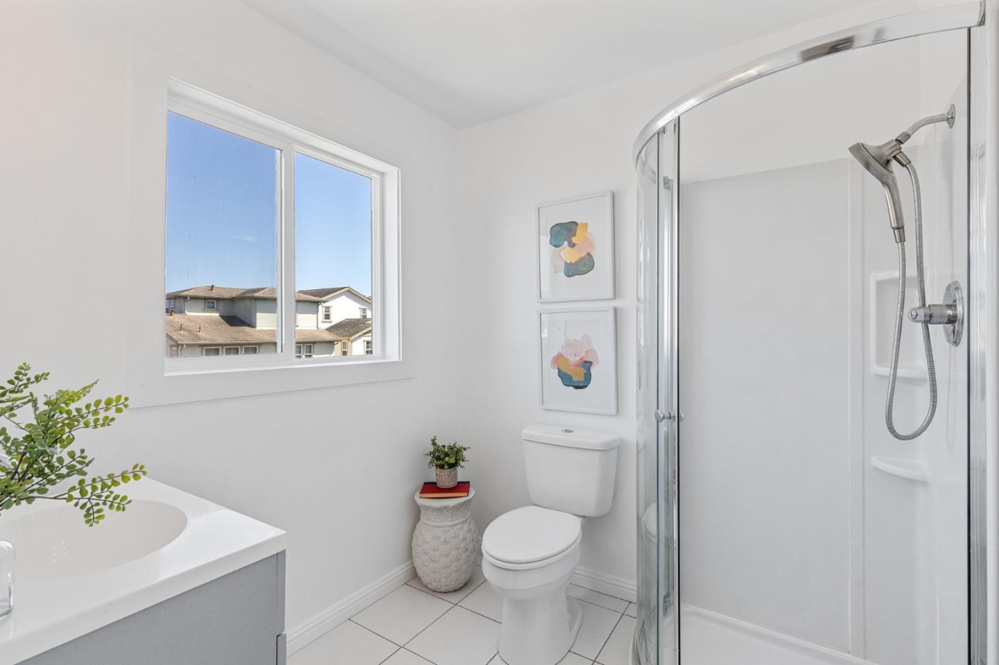 551 Inverness Drive Pacifica, CA 94044 - Photo 27 of 37 a bathroom with a sink toilet and shower