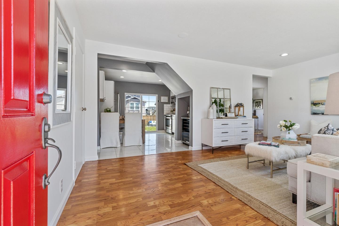 551 Inverness Drive Pacifica, CA 94044 - Photo 3 of 37 a living room with furniture and wooden floor