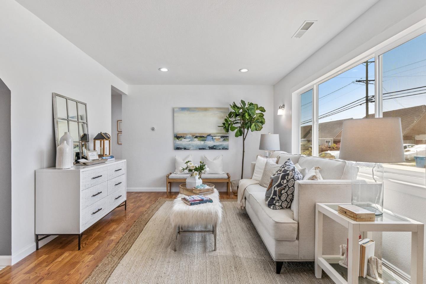 551 Inverness Drive Pacifica, CA 94044 - Photo 5 of 37 a living room with furniture and a wooden floor