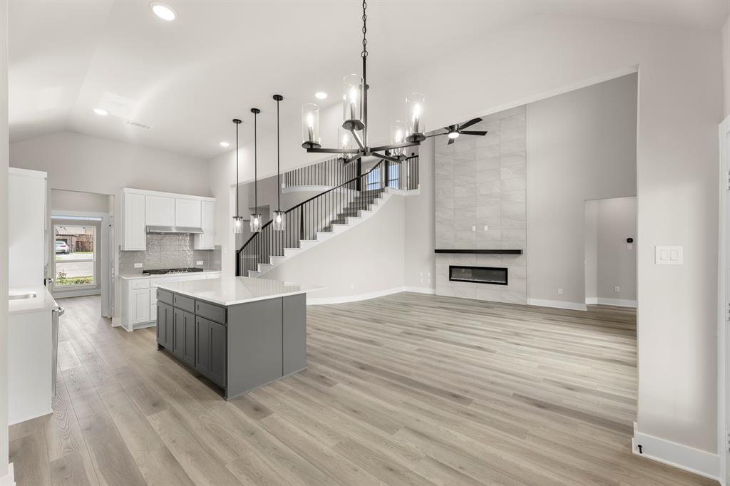 941 Gold Finch Lane Forney, TX 75126 - Photo 14 of 27 a view of entryway and hall with wooden floor
