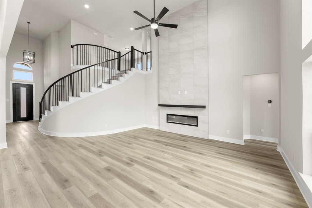 941 Gold Finch Lane Forney, TX 75126 - Photo 8 of 27 a view of an entryway with wooden floor