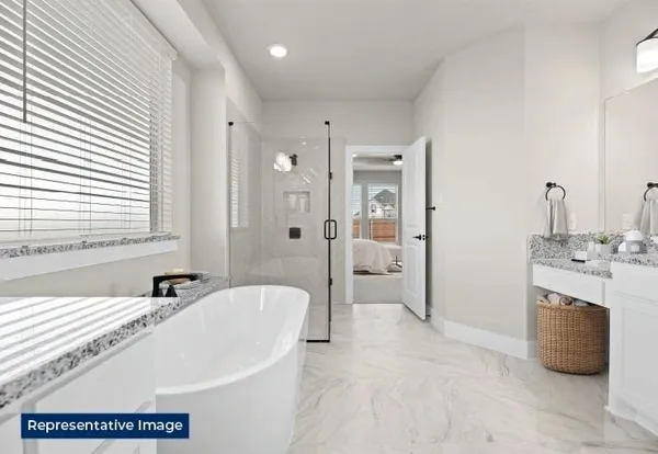 a kitchen with stainless steel appliances kitchen island granite countertop a table and chairs in it