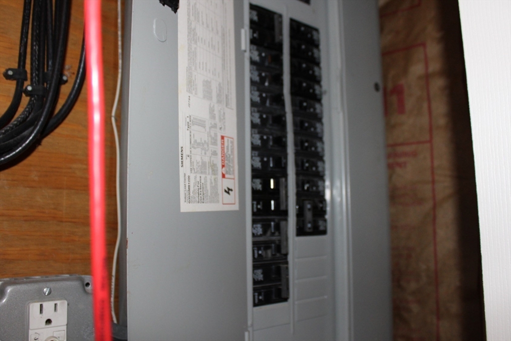 27 Gretchen Way Raynham, MA 02767 - Photo 19 of 20 a close view of walk in closet