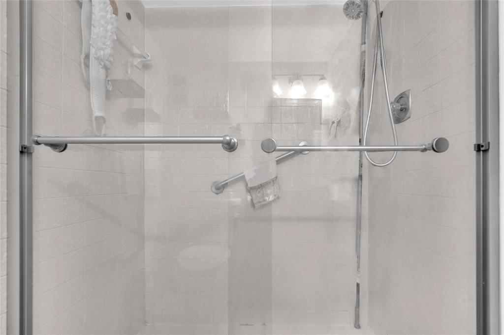 3910 Inverrary Boulevard, Unit 308B Lauderhill, FL 33319 - Photo 20 of 53 a bathroom with a shower