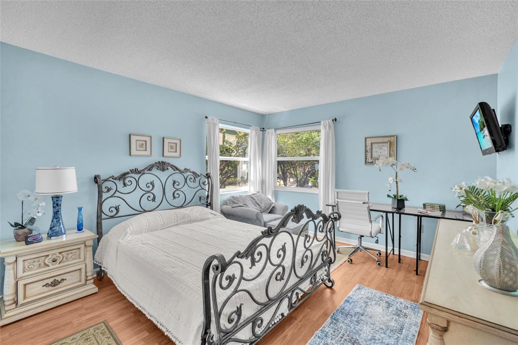 3910 Inverrary Boulevard, Unit 308B Lauderhill, FL 33319 - Photo 22 of 53 a bedroom with furniture and windows