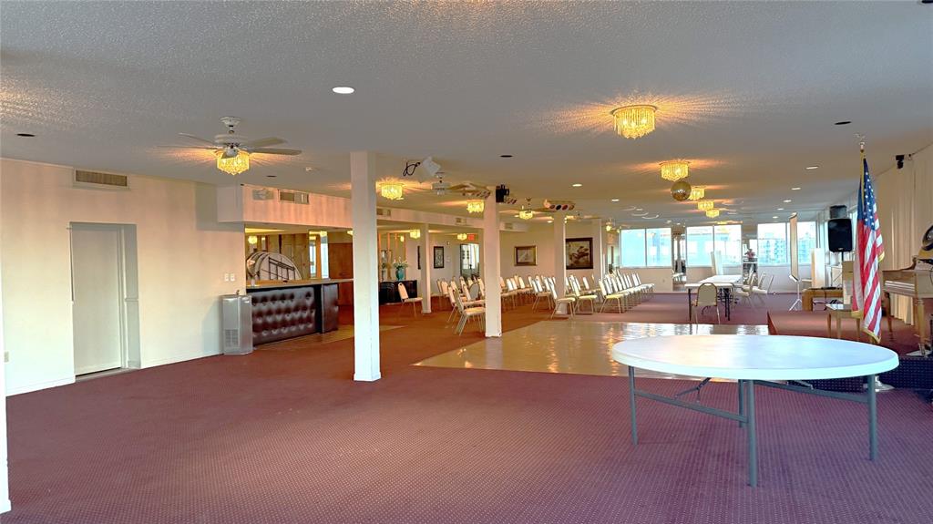 3910 Inverrary Boulevard, Unit 308B Lauderhill, FL 33319 - Photo 51 of 53 a dining room with furniture and a kitchen view