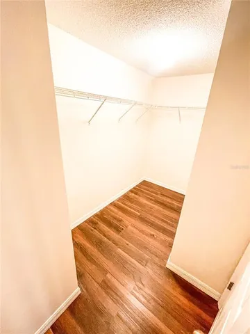 a bathroom with a bathtub and a toilet