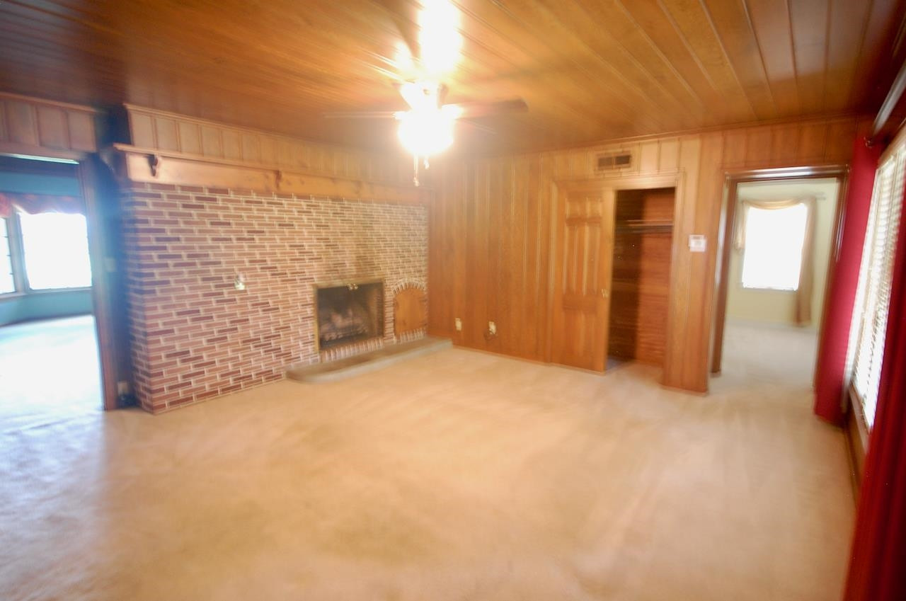 605 South Trenton Street Rutherford, TN 38369 - Photo 11 of 39 a view of an empty room with a fireplace