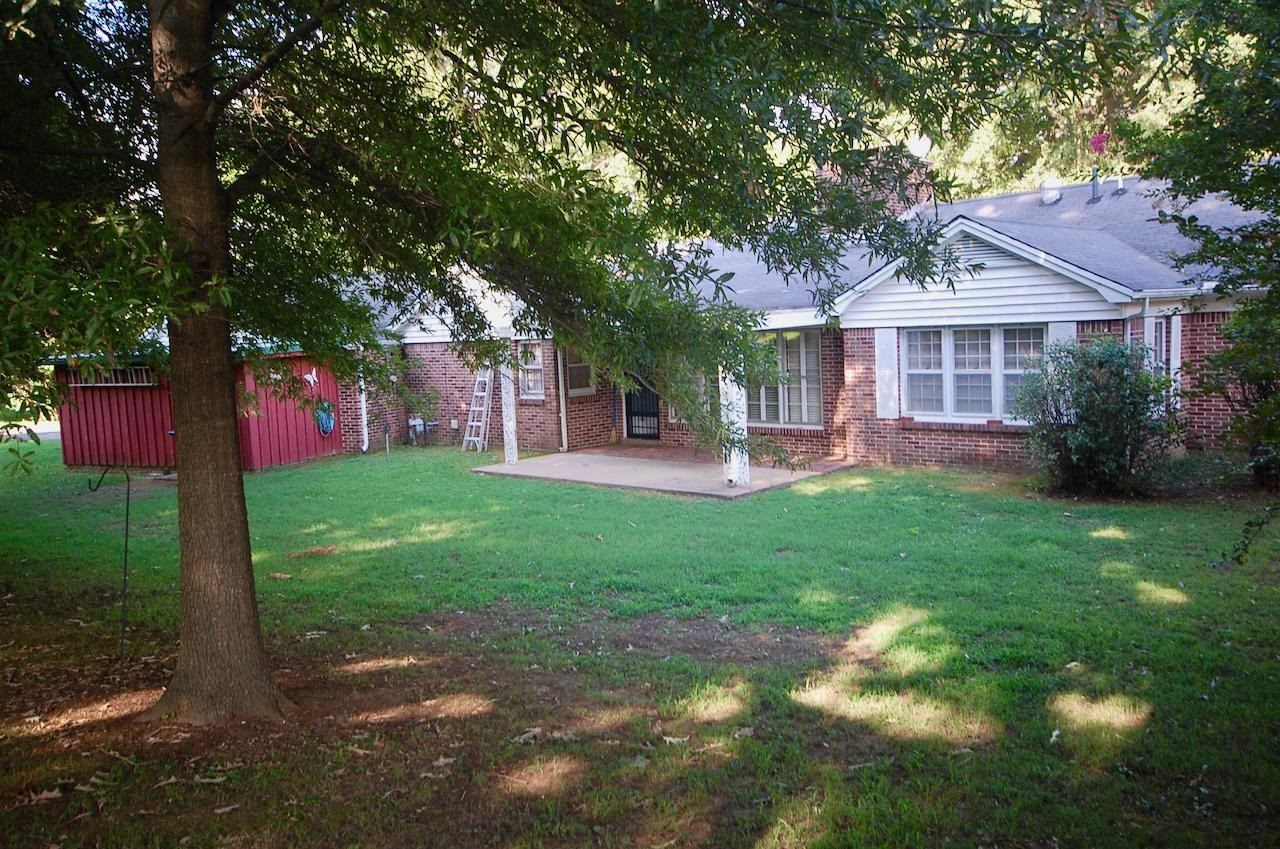 605 South Trenton Street Rutherford, TN 38369 - Photo 31 of 39 a front view of a house with garden