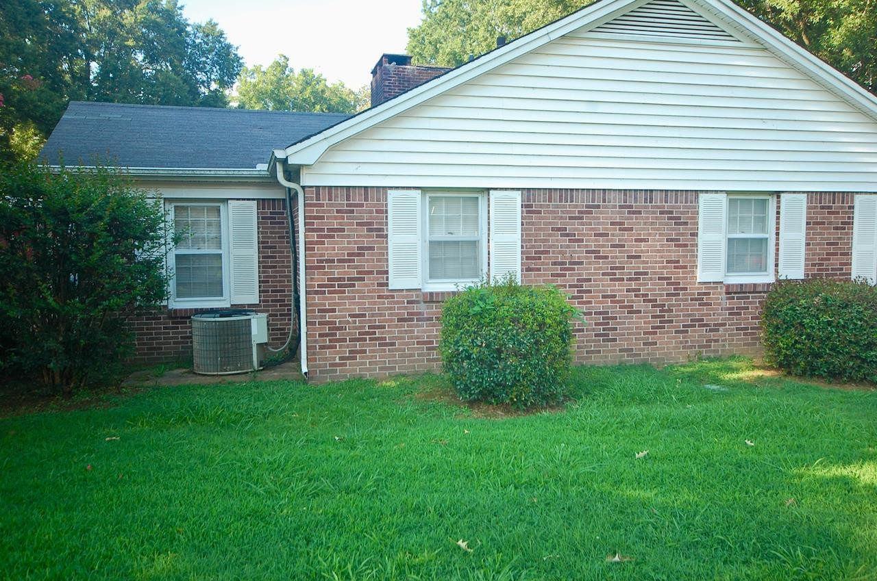 605 South Trenton Street Rutherford, TN 38369 - Photo 33 of 39 a view of a house with a backyard