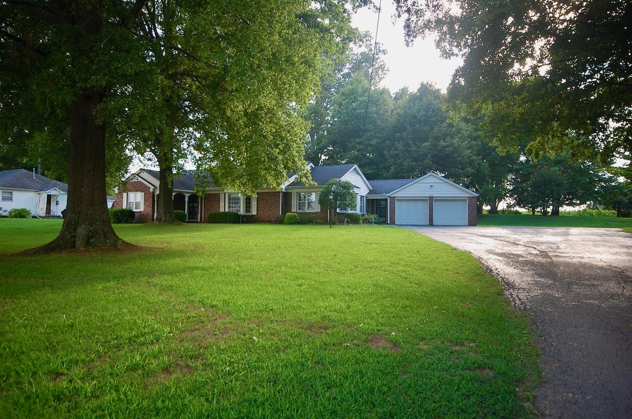605 South Trenton Street Rutherford, TN 38369 - Photo 36 of 39 a view of a house with a yard