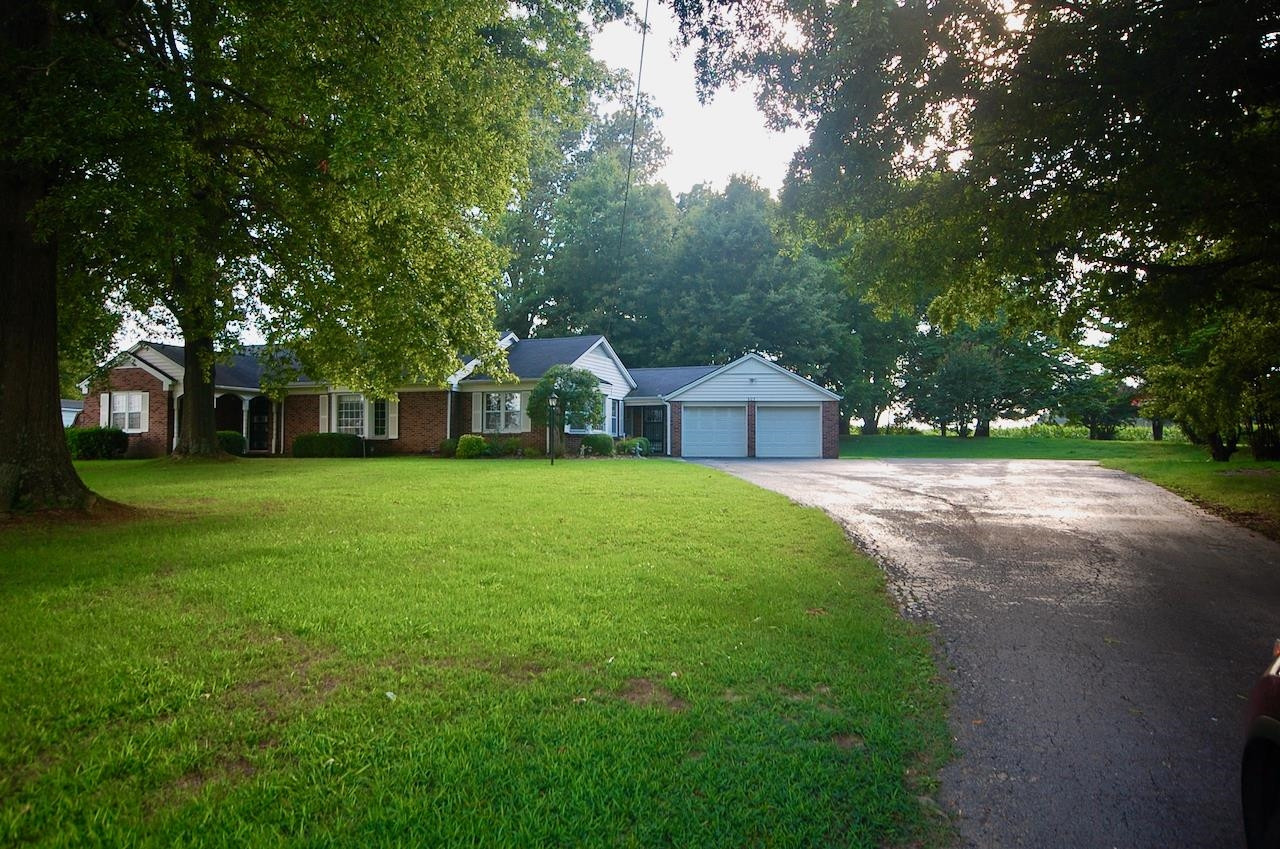 605 South Trenton Street Rutherford, TN 38369 - Photo 37 of 39 a view of a house with a yard