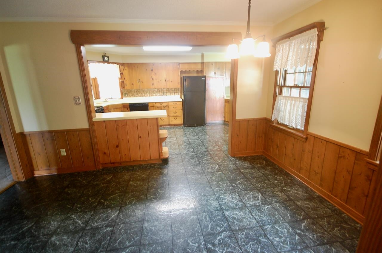 605 South Trenton Street Rutherford, TN 38369 - Photo 5 of 39 a view of a kitchen with wooden floor and a window