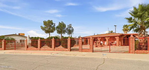 a street view with a building in the background