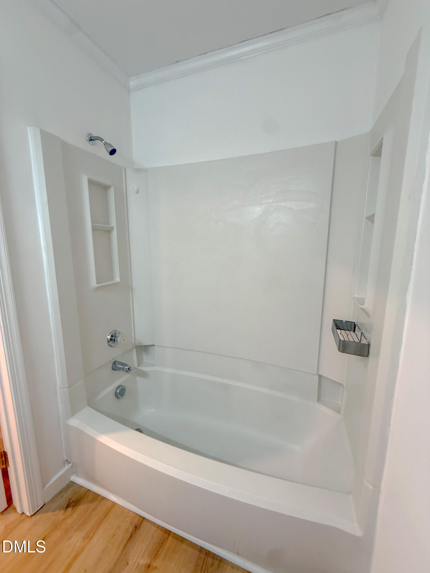 4247 The Oaks Drive Raleigh, NC 27606 - Photo 18 of 21 a bathroom with a bathtub