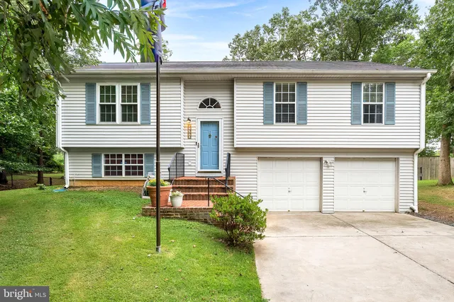 a house view with a garden space
