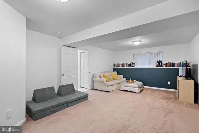 a bed room with furniture and wooden floor