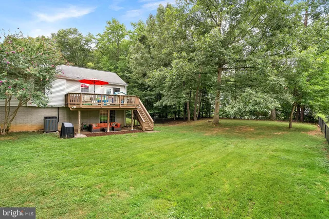 a view of a house with a park