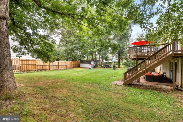 a childrens park with lots of trees