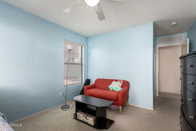 a room with furniture and a window