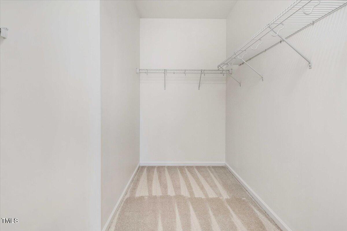 736 Wickham Ridge Road Apex, NC 27539 - Photo 30 of 41 2nd bedroom walk in closet
