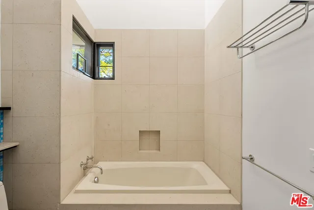 a bathroom with a bathtub