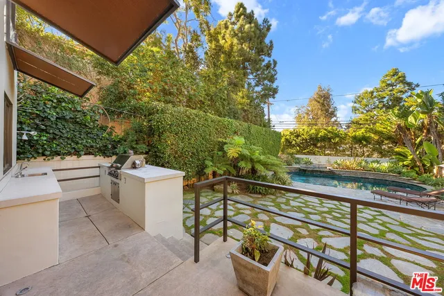 a view of a balcony with chairs