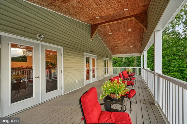 a outdoor living space with furniture and garden view