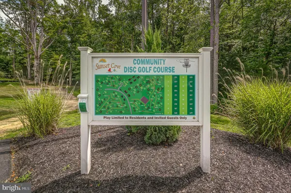 a sign on the side of the road