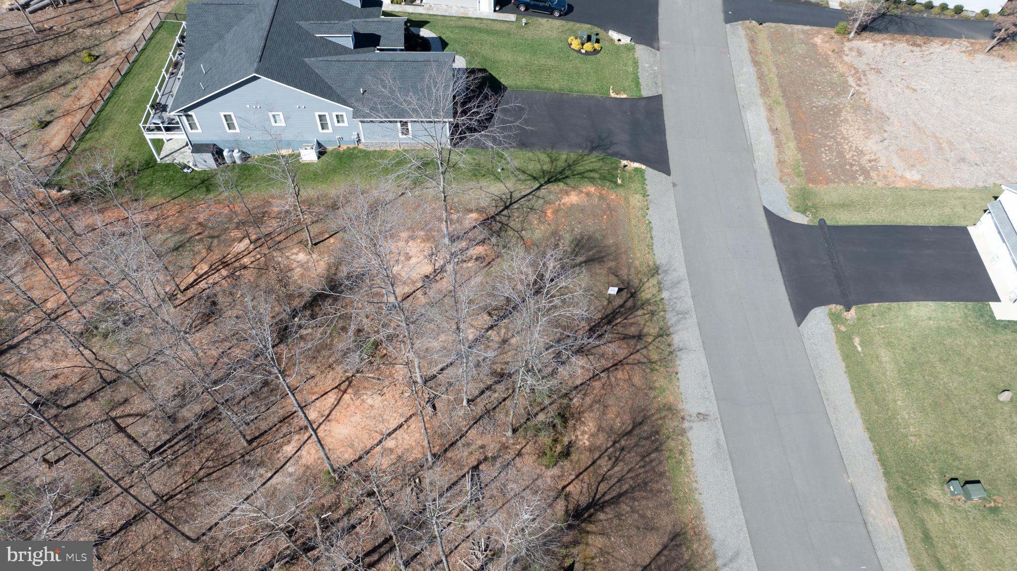 Lot 47 Sunset Loop Mineral, VA 23117 - Photo 44 of 51 an aerial view of a house with backyard