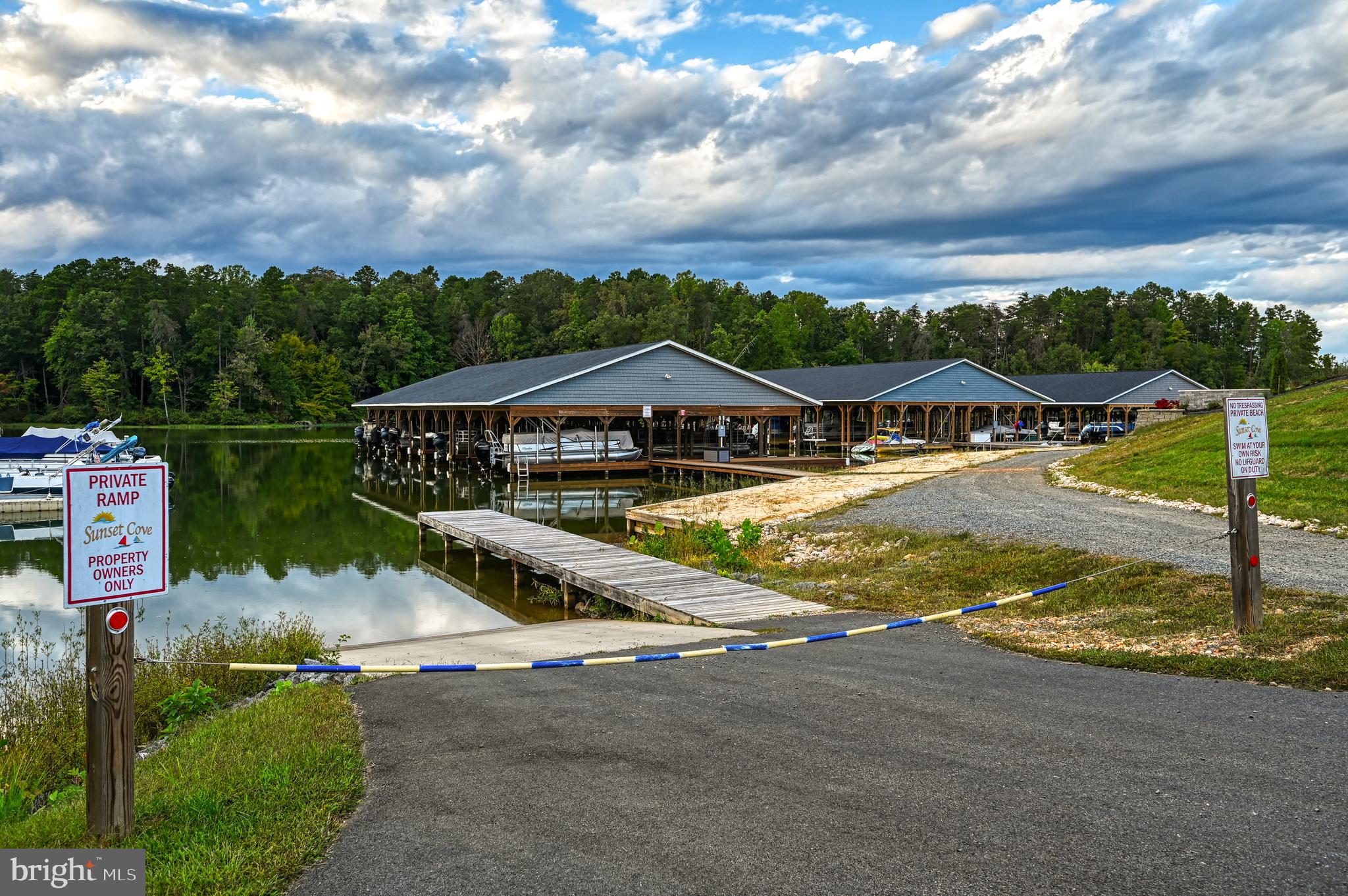 Lot 47 Sunset Loop Mineral, VA 23117 - Photo 6 of 51 a view of swimming pool with lawn chairs and iron fence