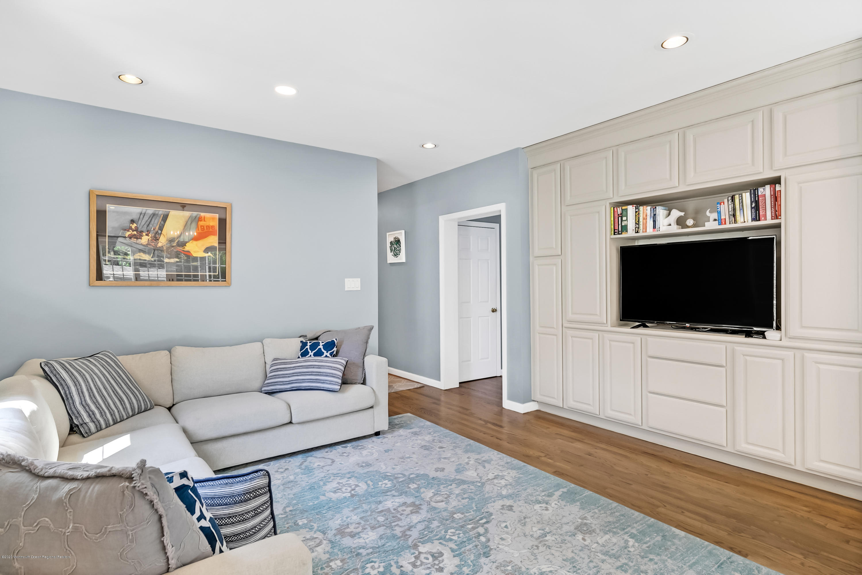 405 Salem Avenue Spring Lake, NJ 07762 - Photo 15 of 44 a living room with furniture and a flat screen tv