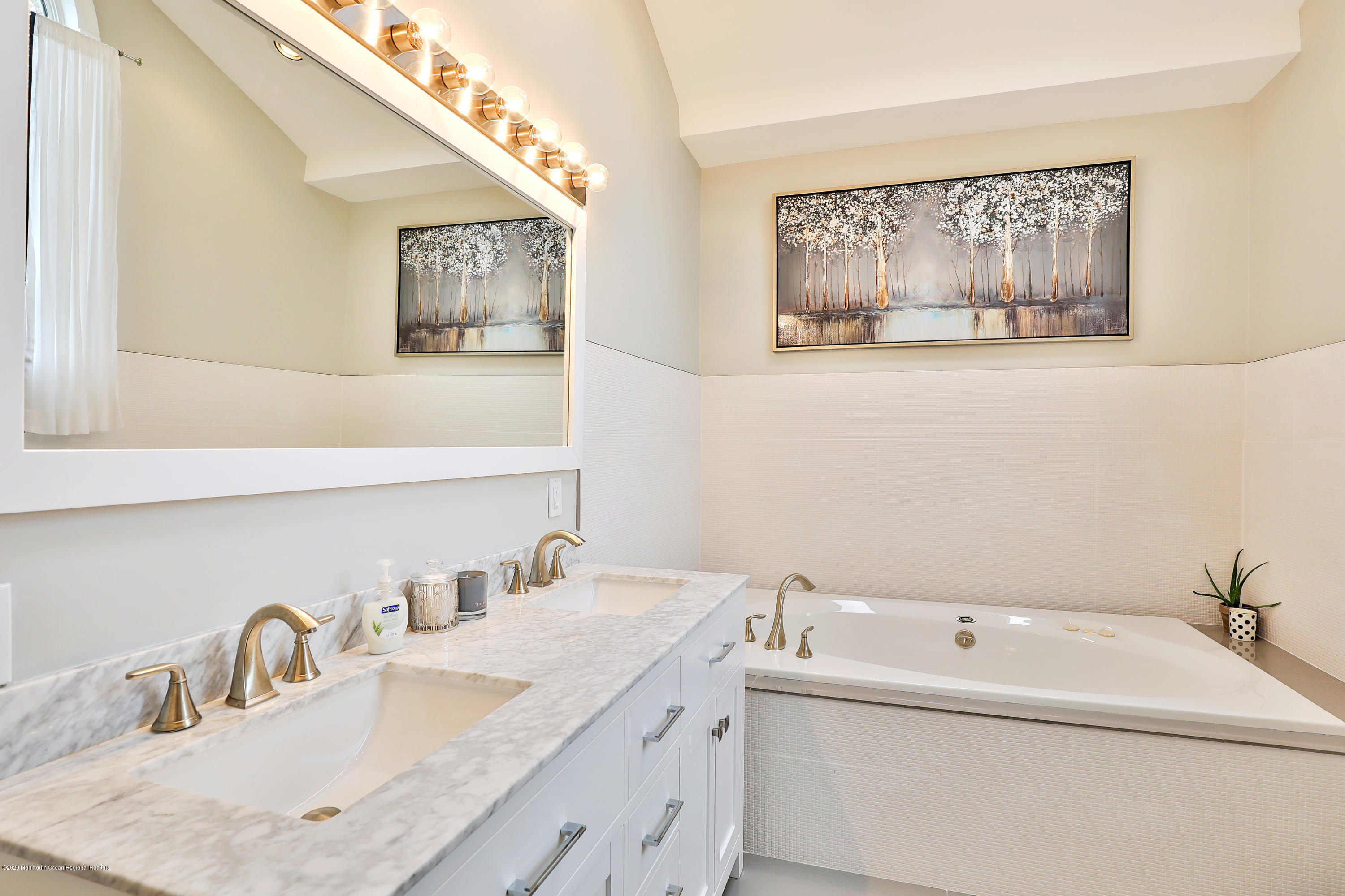 405 Salem Avenue Spring Lake, NJ 07762 - Photo 18 of 44 a bathroom with a granite countertop sink and a mirror