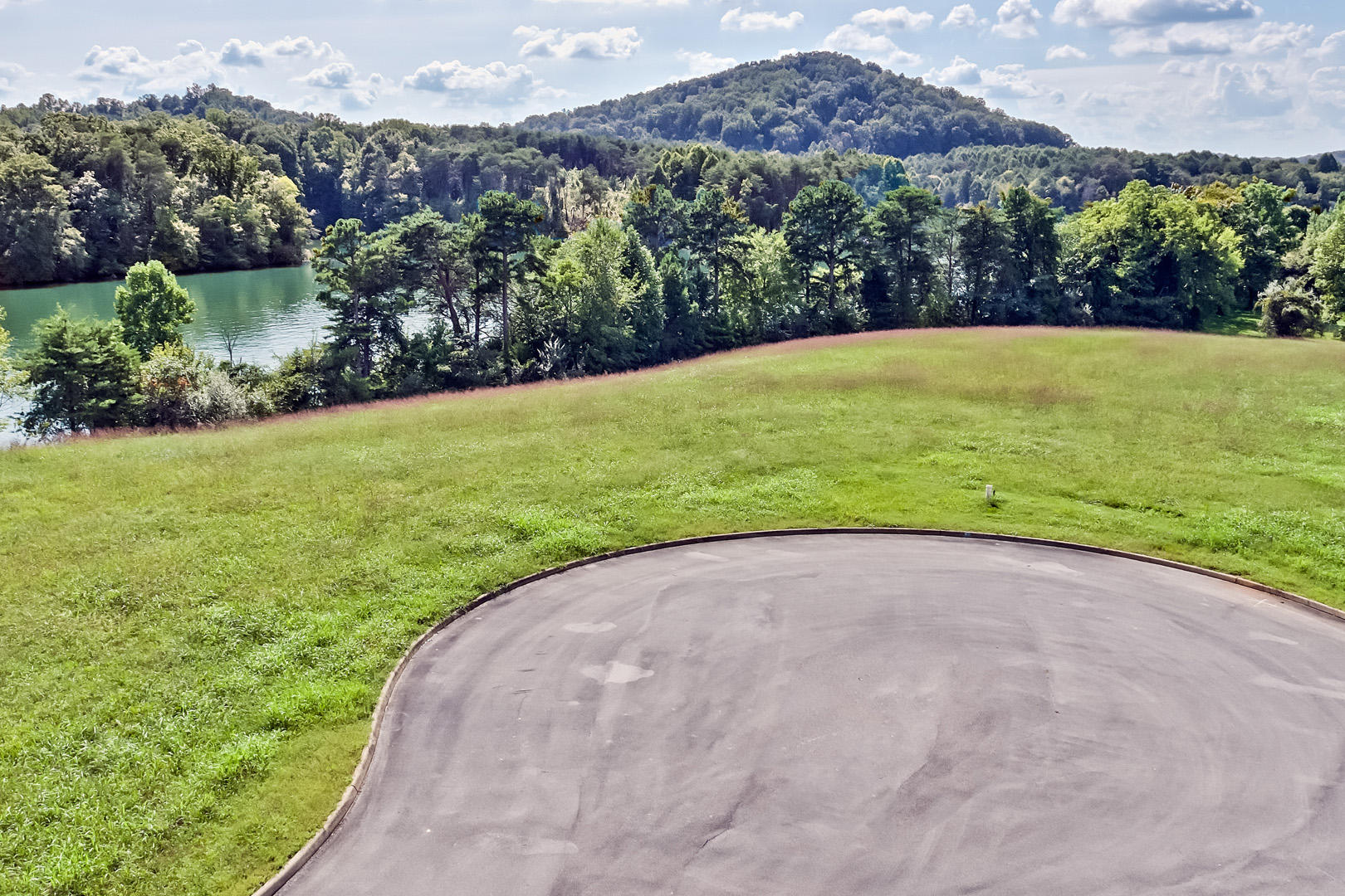 275 Bay Pointe Road Vonore, TN 37885 - Photo 3 of 14 02_BayPointeDrive_889R_ElevatedStreet_W-