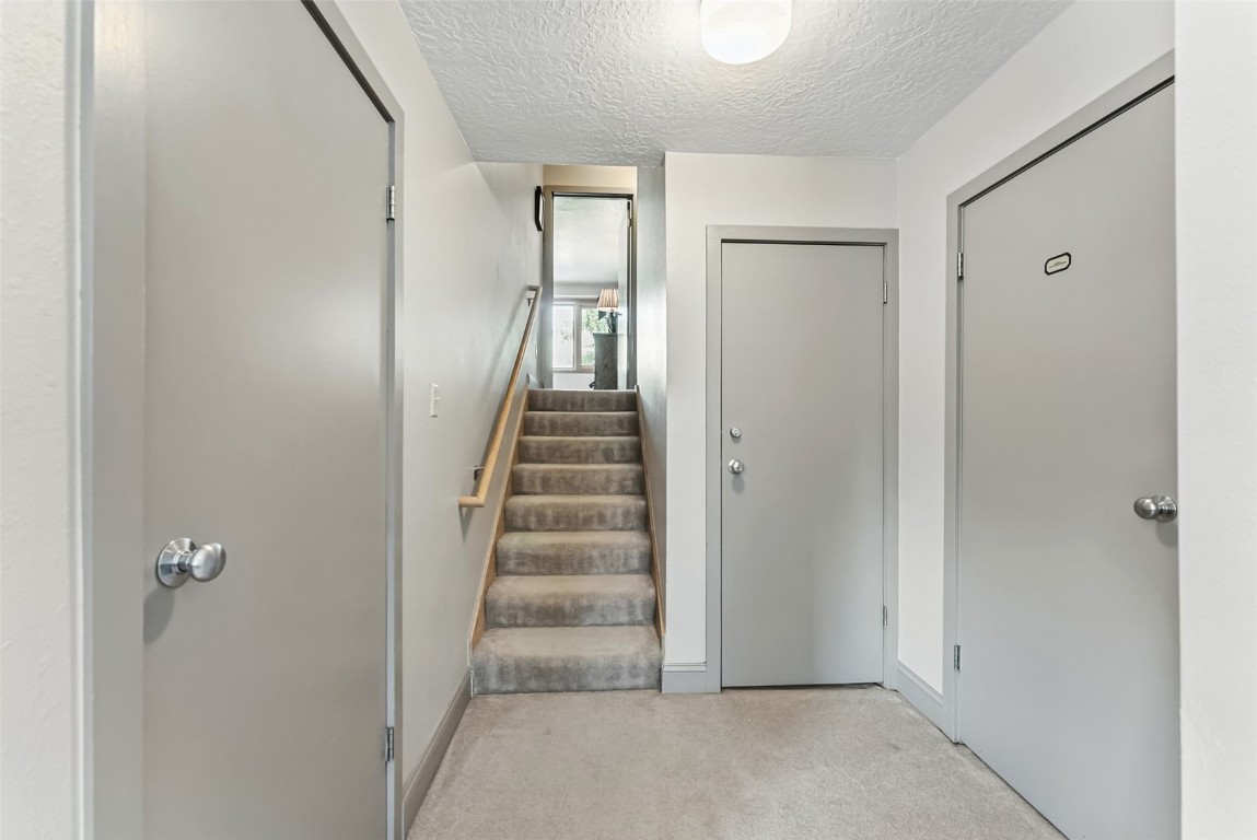 22300 Highway 6, Unit 1745 Keystone, CO 80435 - Photo 18 of 43 a view of a hallway with entryway door