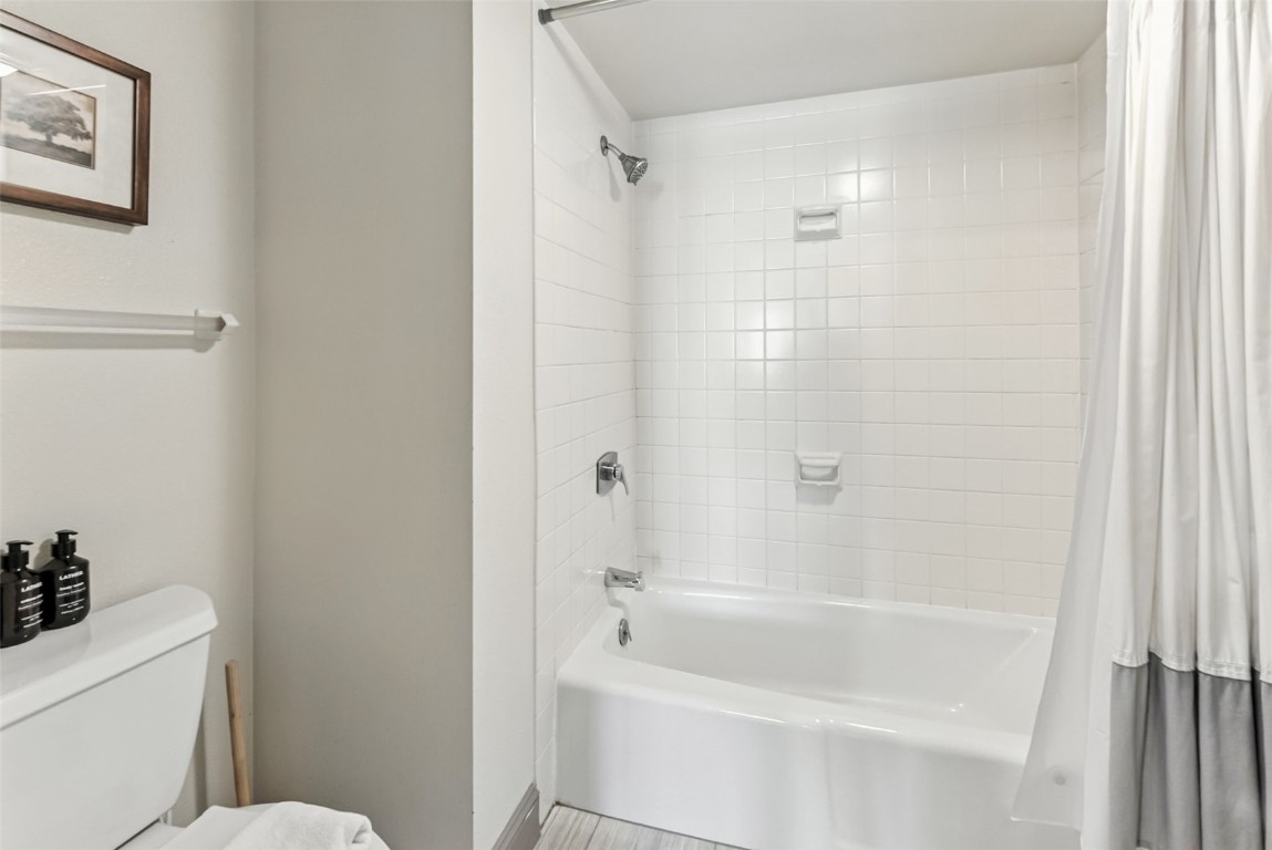 22300 Highway 6, Unit 1745 Keystone, CO 80435 - Photo 28 of 43 a bathroom with a bathtub and a toilet