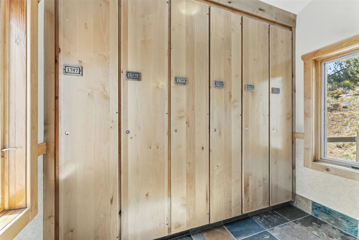 22300 Highway 6, Unit 1745 Keystone, CO 80435 - Photo 30 of 43 a view of a bathroom with a wooden door