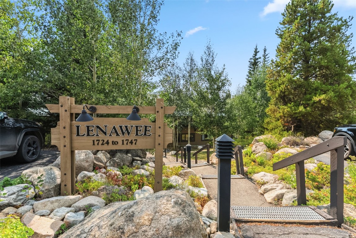22300 Highway 6, Unit 1745 Keystone, CO 80435 - Photo 36 of 43 a street sign on a sidewalk next to a road