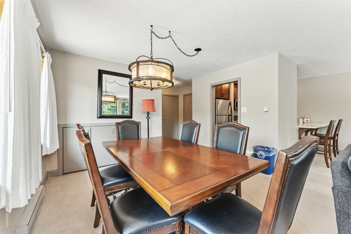 22300 Highway 6, Unit 1745 Keystone, CO 80435 - Photo 10 of 43 a view of a dining room with furniture