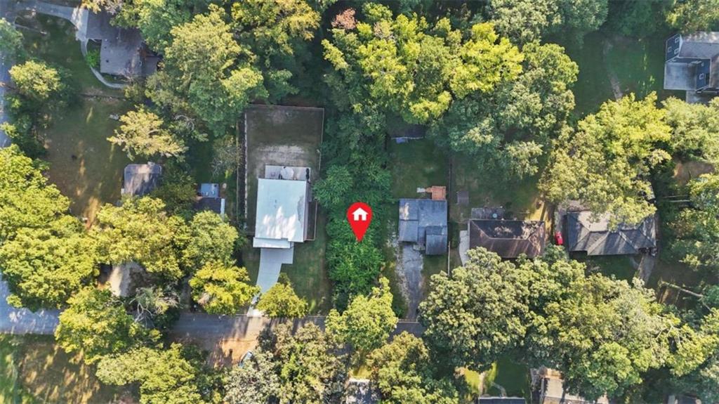 0 Pebble Drive Atlanta, GA 30344 - Photo 14 of 23 a view of a house with a flower garden