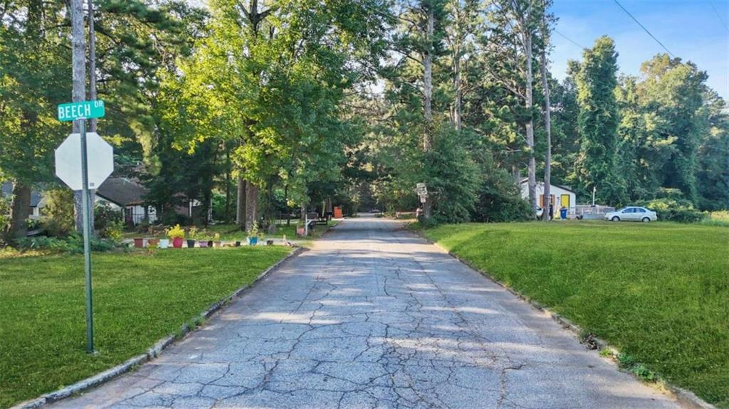 0 Pebble Drive Atlanta, GA 30344 - Photo 3 of 23 a view of a park with large trees