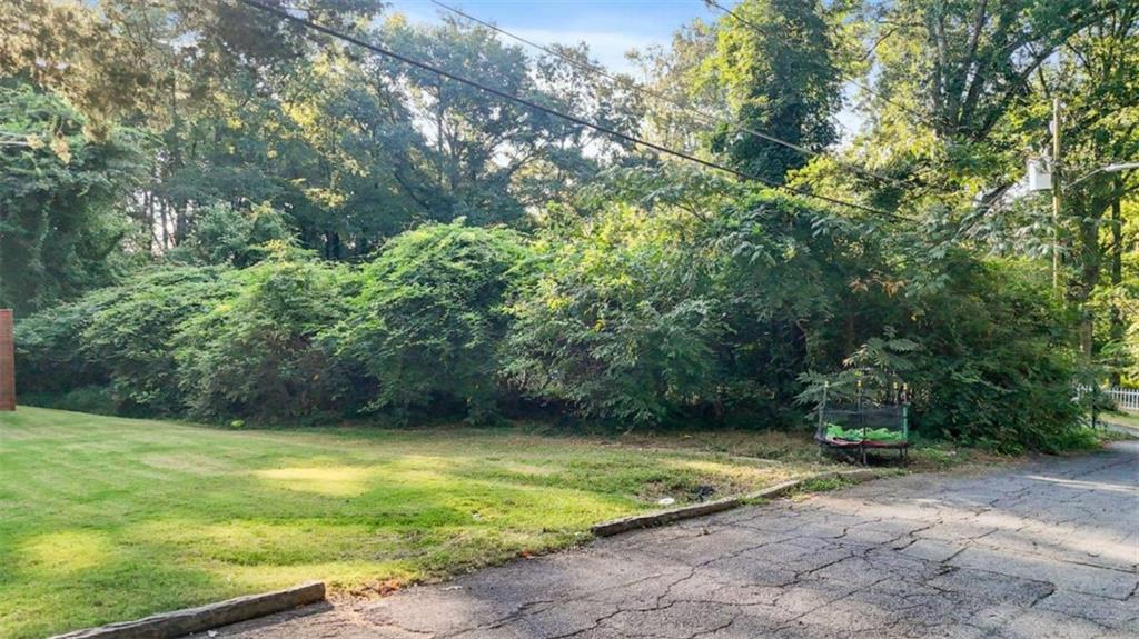 0 Pebble Drive Atlanta, GA 30344 - Photo 6 of 23 a view of a yard with an outdoor space