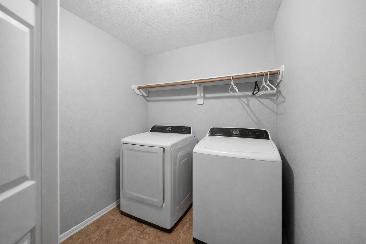 7902 Sesame Street Baytown, TX 77521 - Photo 19 of 24 a utility room with dryer and washer