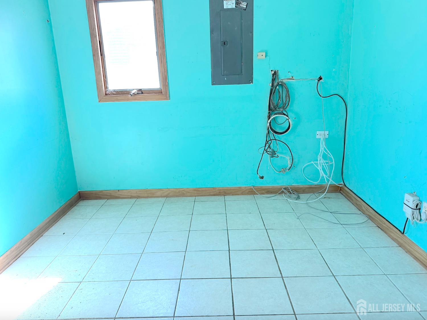 4 Forrestal Road Kendall Park, NJ 08824 - Photo 20 of 22 a view of a room with window and wooden floor