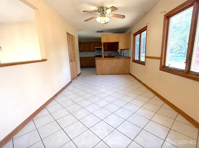 a view of an empty room and window