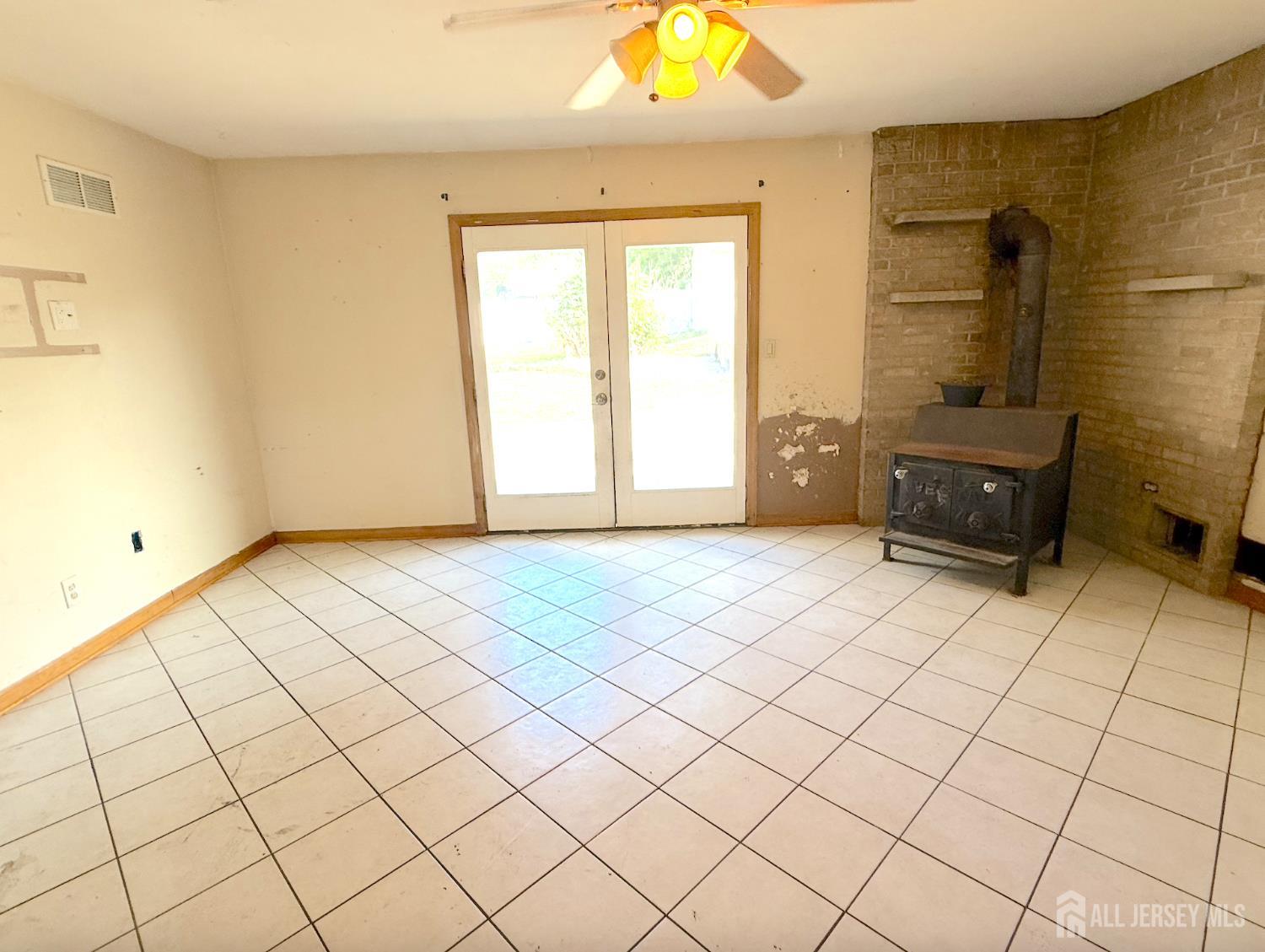 4 Forrestal Road Kendall Park, NJ 08824 - Photo 9 of 22 a view of an empty room and window