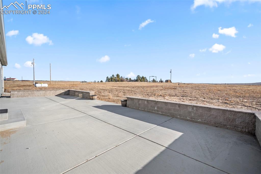 9393 North Log Road Calhan, CO 80808 - Photo 40 of 49 a view of an ocean and beach